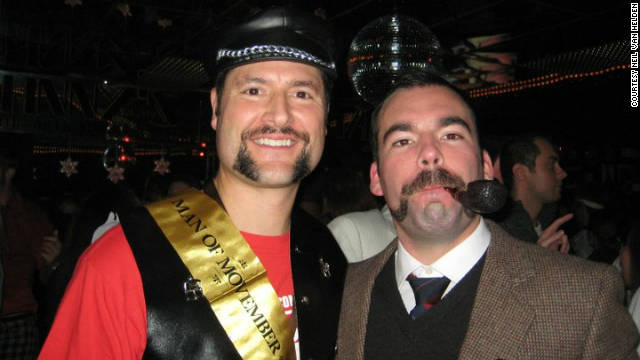 Neil Van Helden, right, proudly displays his mustache at last year's Movember event at Johnny's Hideaway in Atlanta.